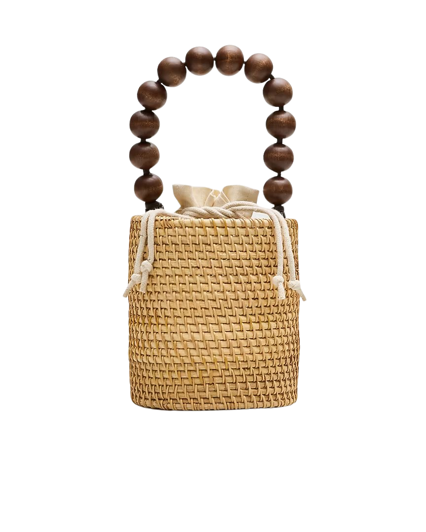 Handknotted rattan bucket bag with wood beads